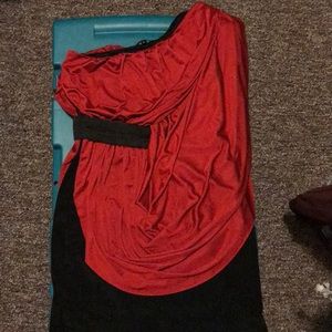 Mid length, red, off the shoulder formal dress.